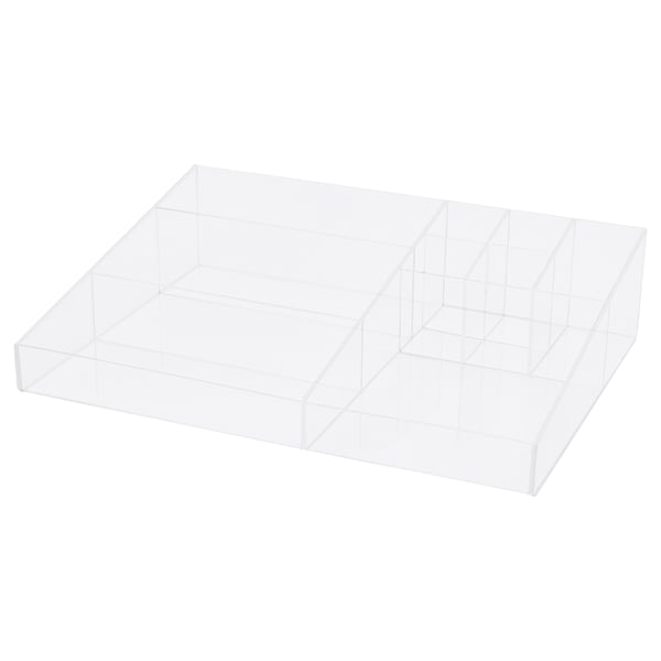 Clear acrylic make-up organiser tray with varied compartments for storage.
