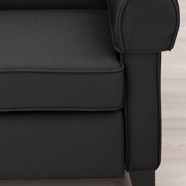 Close-up of a comfortable, dark-colored MUREN recliners armrest and seat, showcasing its high-quality fabric and design.