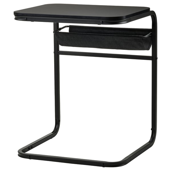 An OLSERÖD side and coffee table in black with a fabric pouch, designed for multifunctional use in living spaces.