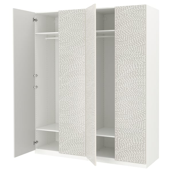 White PAX wardrobe with textured doors, soft close hinges, and adjustable shelves.