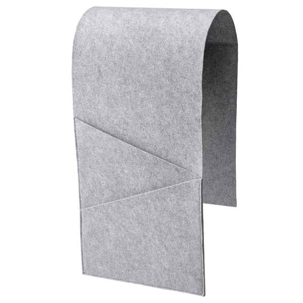 A grey SILÄNG storage pocket with geometric design, made of polyester and felt, for organising items near sofas or chairs.