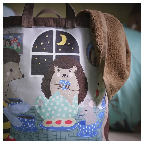 Adorable hedgehog family tea party scene on storage bag. Plush handle, intricate details, vibrant colours.