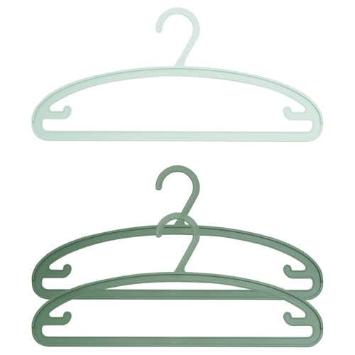 Two pastel green plastic hangers, designed for clothes, with anti-slip functions and extra hooks, one stacked on the other.