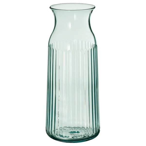 SMÖRFISK: green, glass carafe with vertical lines. Comfort grip for serving beverages. Elegant, simple design.