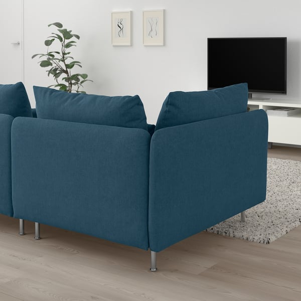 SÖDERHAMN teal sofa, modern low design, spacious, with dark blue cushions. A large, comfortable centrepiece in the room.