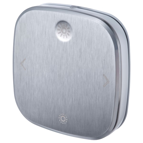 Stainless steel square remote control for smart lighting, sleek modern design with brushed finish.