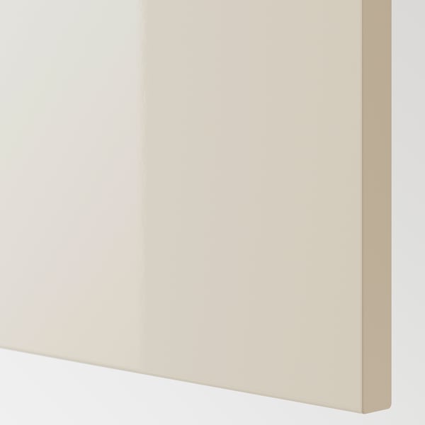Beige glossy surface panel with smooth, clean edge.