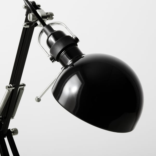 Adjustable steel desk lamp with black shade, featuring chrome accents and quality construction for durability.