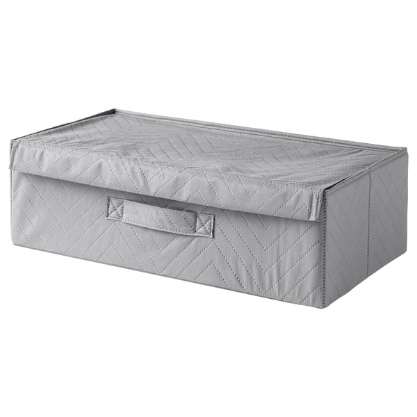 A FULLSMOCKAD storage box in grey. Made of polypropylene fabric, it is rectangular with a quilted pattern, and a handle on the side for easy carrying.
