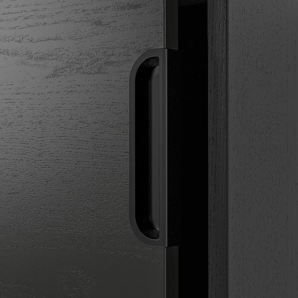Black cabinet with minimalist handle, showcasing sleek design and durable construction.