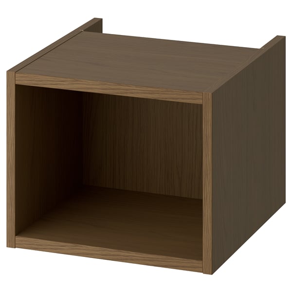 A HAGAÅN open cabinet in a wood finish. Its a square-shaped storage unit with a simple, modern design, perfect for bathroom essentials.