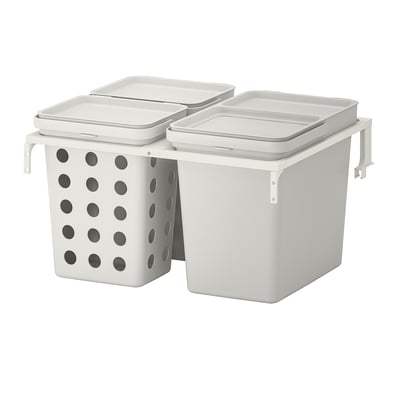 Two white waste sorting bins, one with holes, mounted side by side on a support frame.