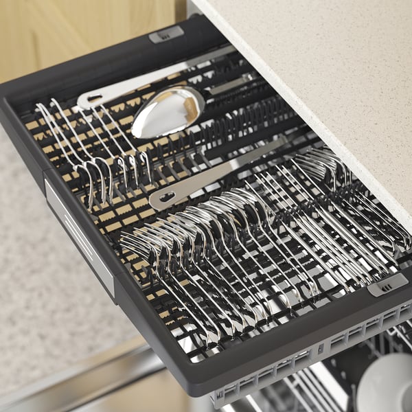 Open dishwasher showcasing organised utensils in multiple levels, demonstrating its spacious and adjustable storage.