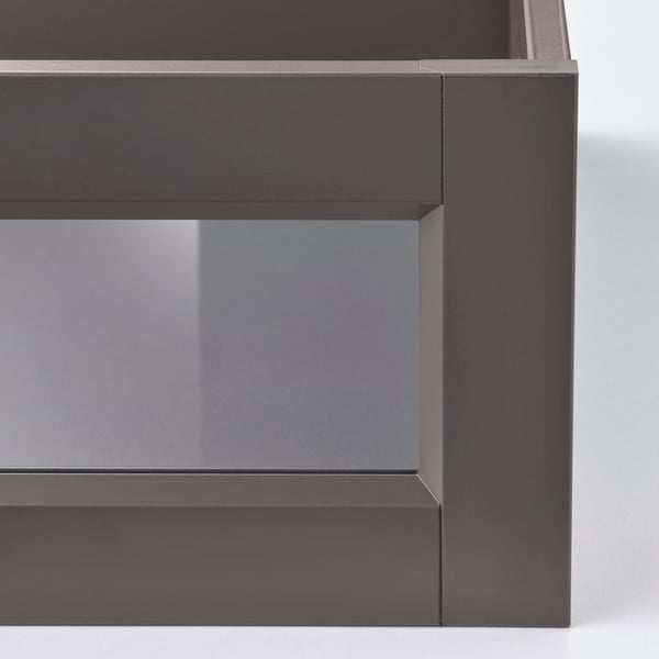 Dark grey glass-fronted drawer with sleek metal frame; high-quality design.