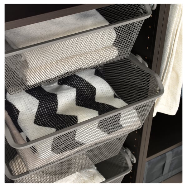 Mesh storage basket for folded clothes, allowing air circulation and easy visibility of contents.