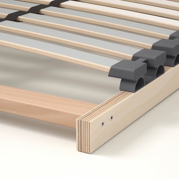 Close-up of LÖNSET bed base, showing well-crafted wooden slats and supportive holders.