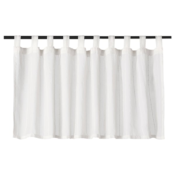 MATILDA white tab top curtains, made from recycled polyester, hanging straight.