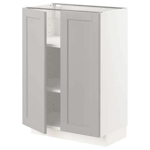 A light grey METOD kitchen cabinet with two doors open, showing shelves inside.
