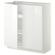 White high-gloss ikea METOD kitchen cabinet with adjustable shelves.