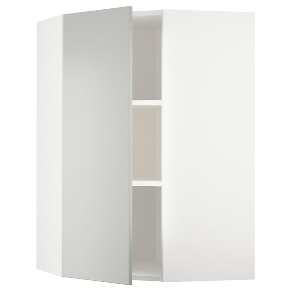 White corner cabinet, part of ikeas METOD kitchen system, featuring light grey havstorp fronts with a sleek, modern design.