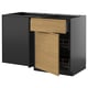 Modern kitchen unit, black METOD cabinet with oak drawer and door, featuring sleek design and minimalist handles.