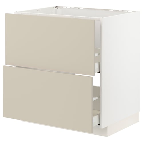 An off-white METOD kitchen cabinet with beige havstorp fronts, featuring a smooth, rectangular design with integrated drawers.