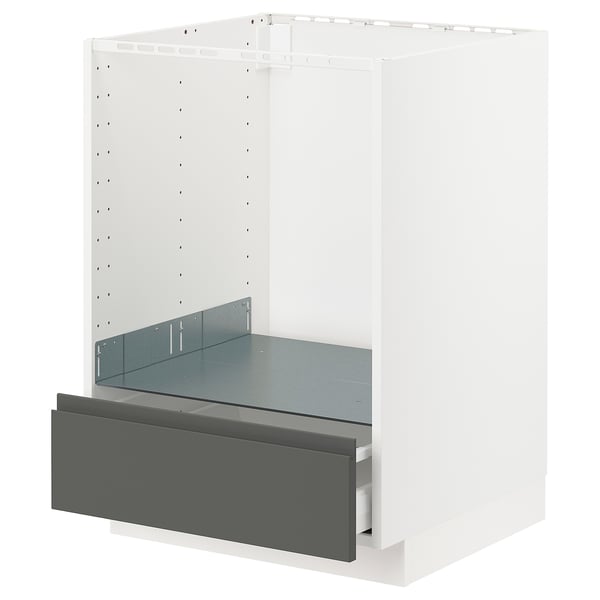 White METOD kitchen cabinet with dark grey drawer, partial open.
