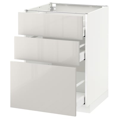 Modern white METOD kitchen cabinet with 3 glossy drawers.