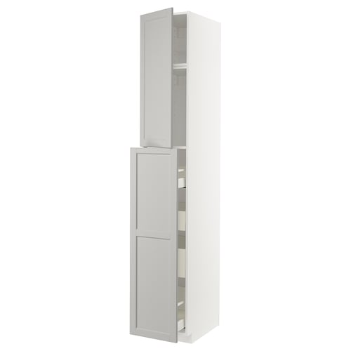 White tall kitchen cabinet with beveled edges and two open doors showing shelves.