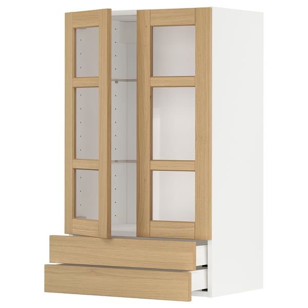 Modern kitchen unit with oak veneer and glass doors. Includes drawers, shelves, and adjustable fittings.