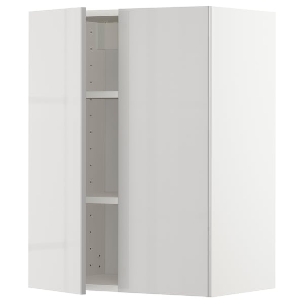 White METOD kitchen cabinet with high gloss grey shelves.