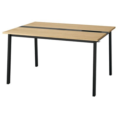 A MITTZON conference table with a light brown top and black legs, featuring a square shape and simple design.