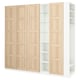 A light-colored wooden PAX wardrobe with white accents, combining closed and open sections for storage.