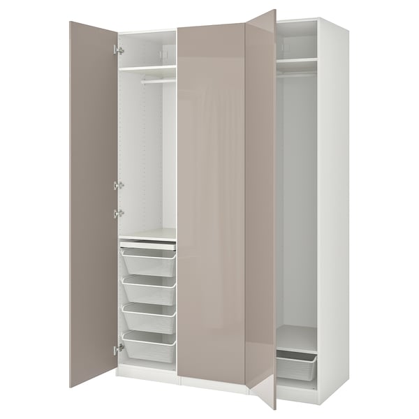 An open beige PAX wardrobe with shelves and drawers.