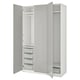 White PAX wardrobe with shelves, drawers, baskets, and rails.