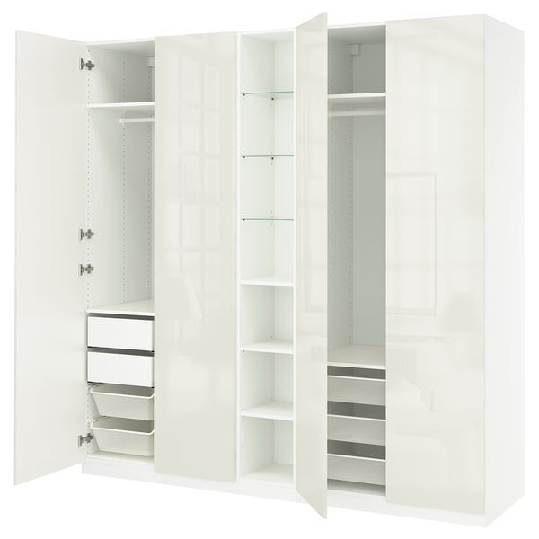 White IKEA PAX wardrobe with shelves, drawers, and mesh baskets.