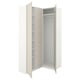 White PAX wardrobe with open doors, displaying shelves.
