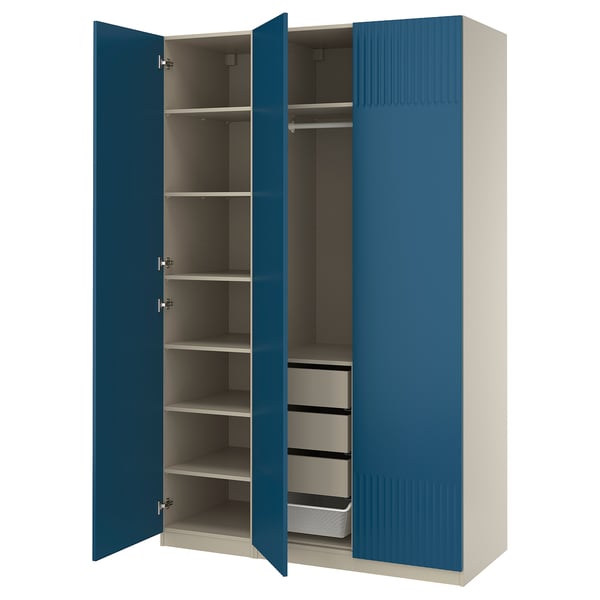 Open blue PAX wardrobe with shelves and drawers.