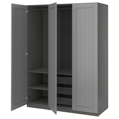 A grey PAX wardrobe with open doors, displaying shelves and a mesh basket.