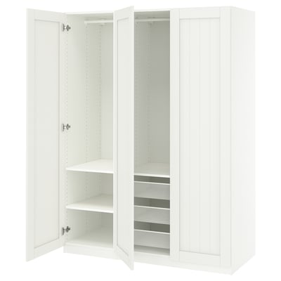 An open white ikea PAX wardrobe. It adjustable shelves, mesh basket, and soft-close hinges.
