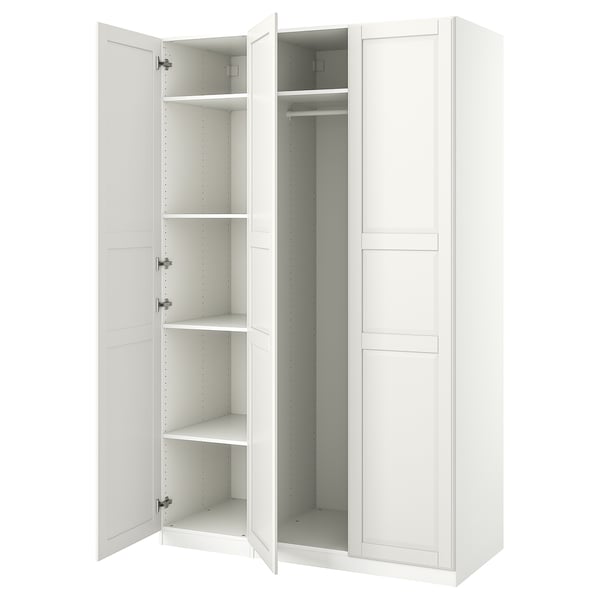 An open white ikea PAX wardrobe with shelves and a clothes rod.