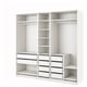 A white PAX wardrobe system with drawers and shelves for efficient storage.