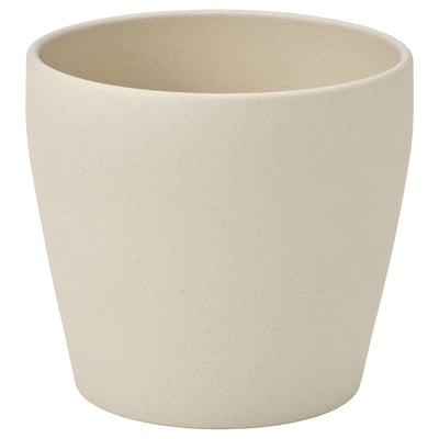 Beige cylindrical planter for indoor plants