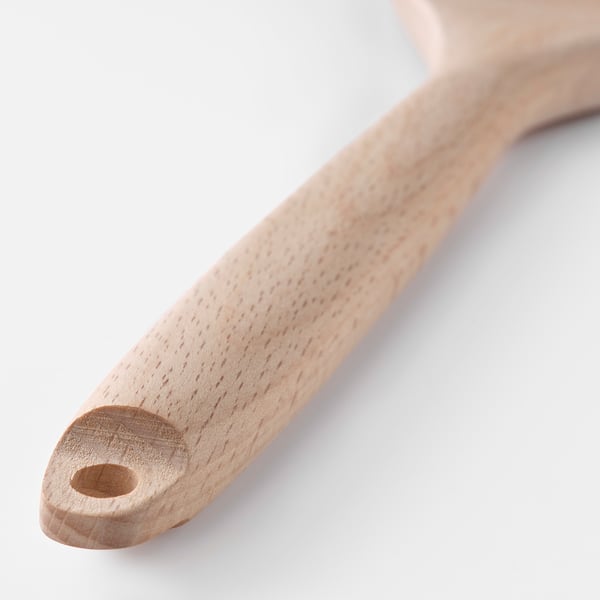Wooden kitchen utensil with non-stick coating, smooth handle