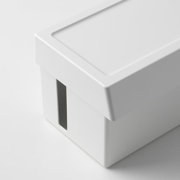 Minimalist white plastic storage box with a slightly larger lid, designed for organising and hiding electronic accessories.