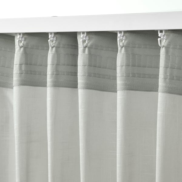 SILVERLÖNN sheer curtains with heading tape for easy pleats. Philtres light, adds privacy.
