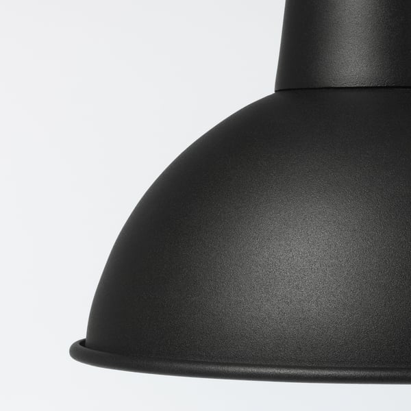 Close-up of black SKURUP lamp, sleek and modern, made of robust steel and high-quality paint.