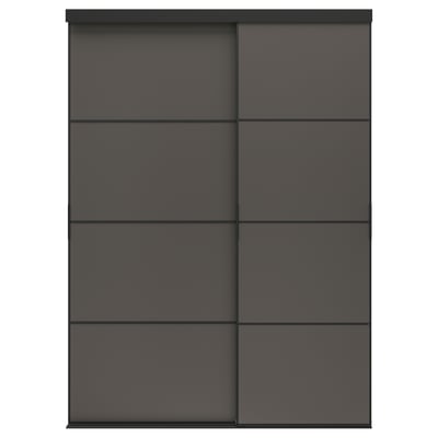A SKYTTA dark grey sliding wardrobe with minimalist design. It four panels with a sleek, modern look.