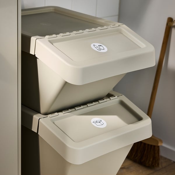 Two stacked SORTERA waste bins, each with a foldable and removable lid, ideal for sorting different types of waste or laundry.