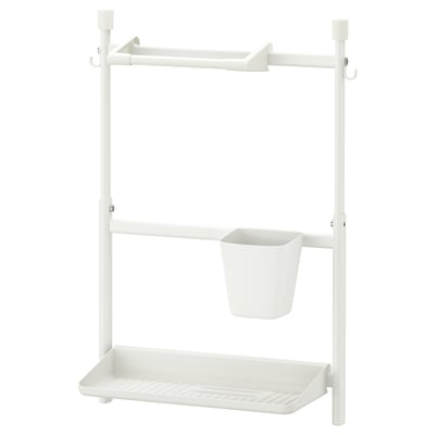 A white SUNNERSTA storage rack with hooks, a hanging basket, and a shelf.